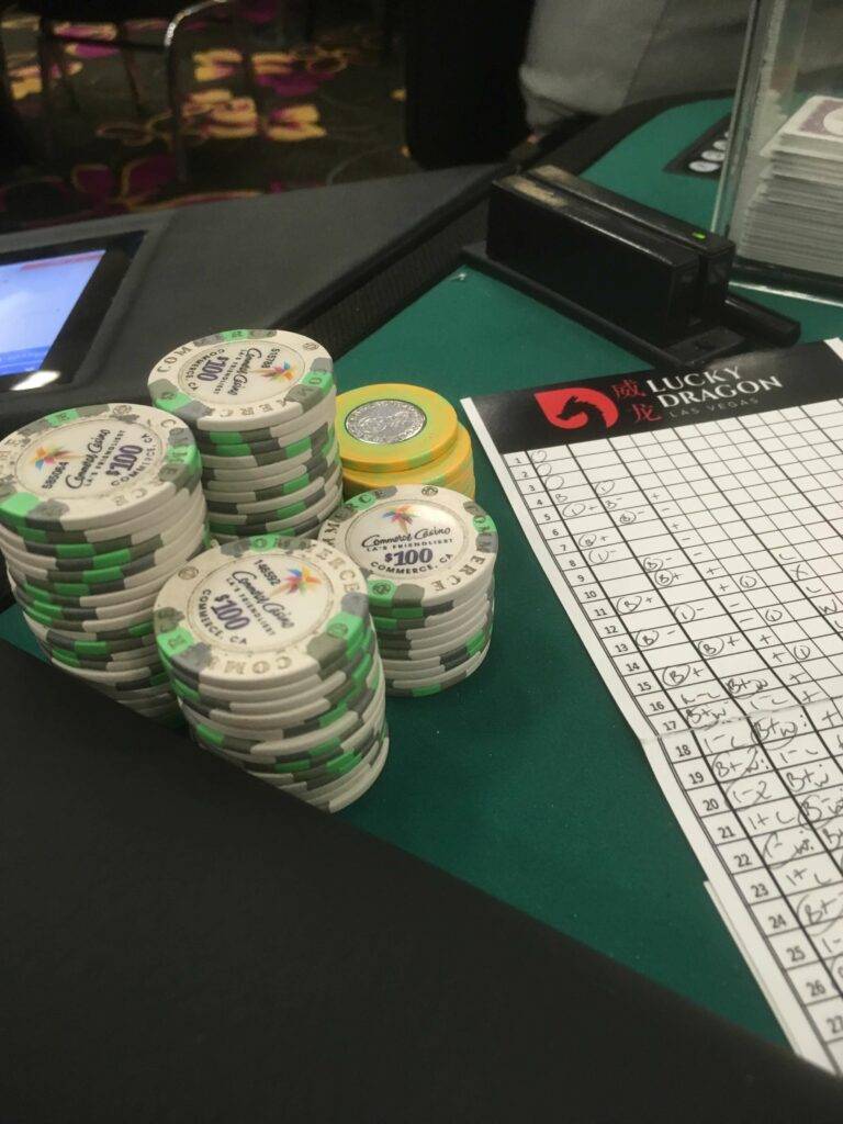 baccarat-scorecard-and-stacks-of-chips