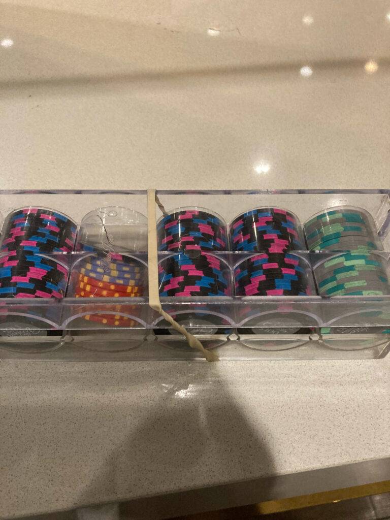 table-with-a-rack-holding-baccarat-winnings